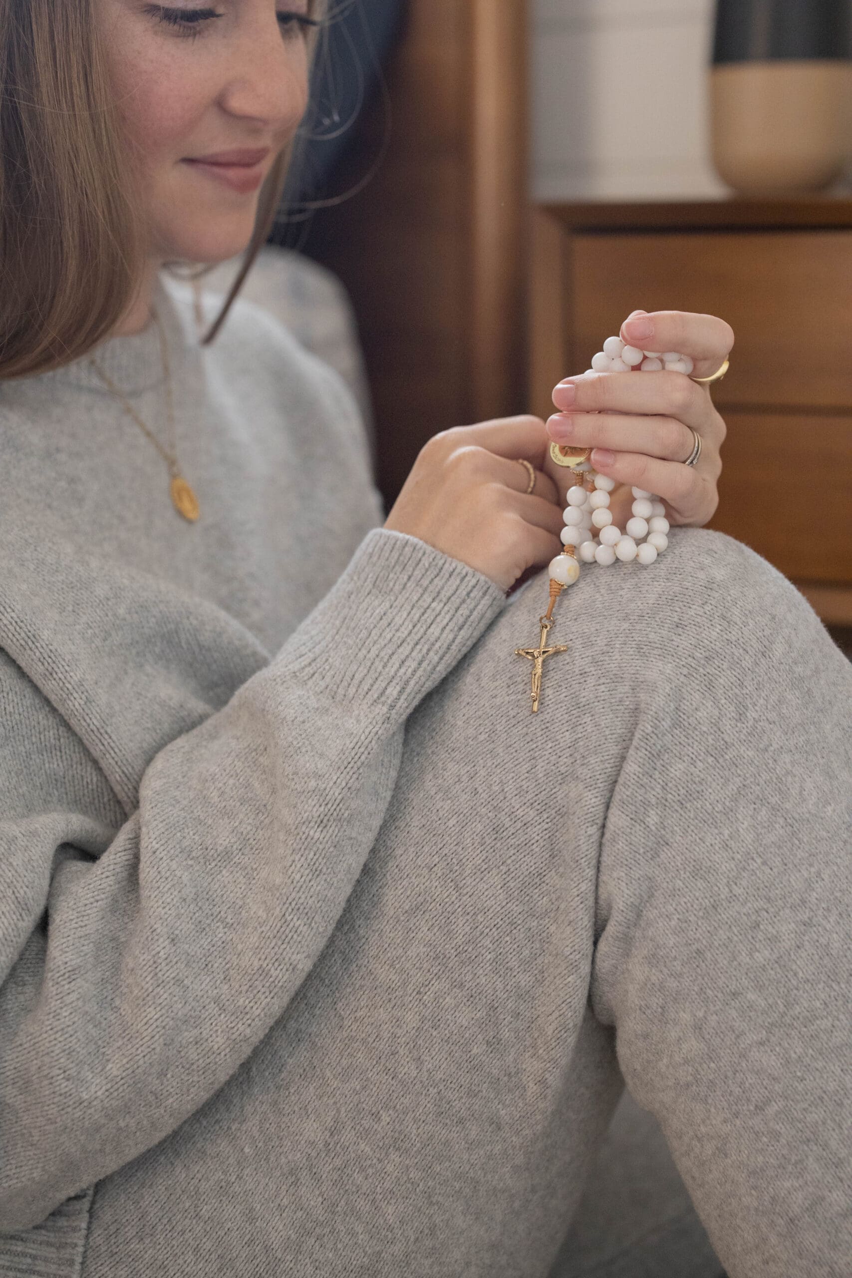 Melissa praying rosary